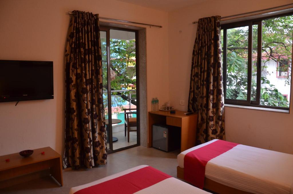 Sunkissed Plaza Hotel Calangute Quarto foto