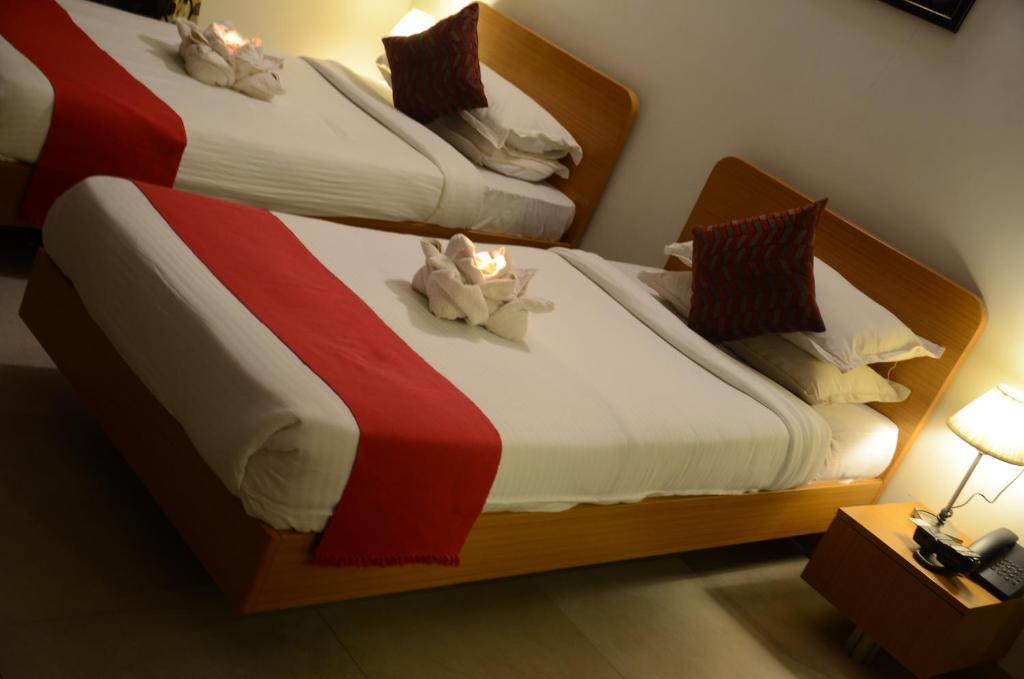 Sunkissed Plaza Hotel Calangute Quarto foto