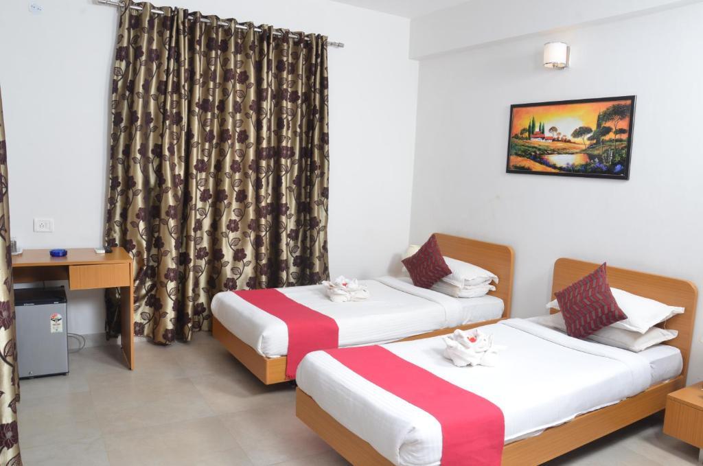 Sunkissed Plaza Hotel Calangute Quarto foto